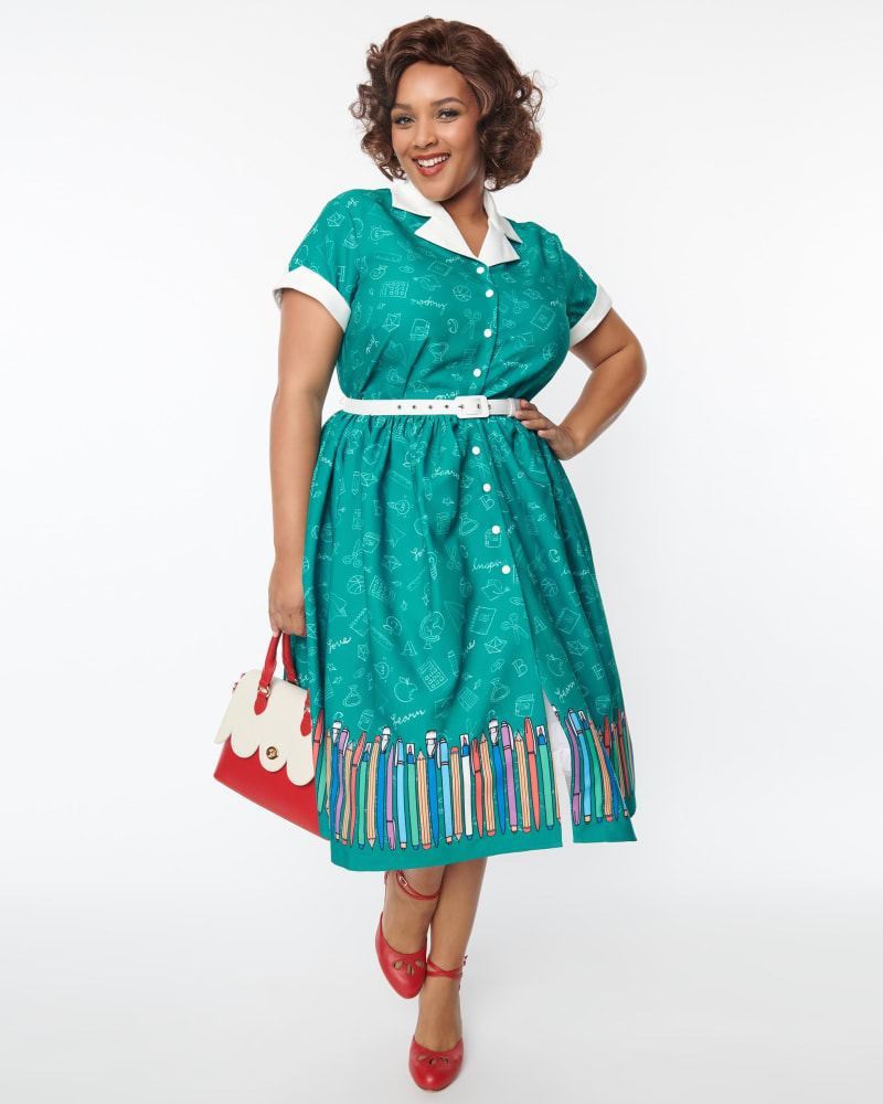 Front of a model wearing a size 5X Unique Vintage Green Classroom Alexis Swing Dress in Green by Unique Vintage. | dia_product_style_image_id:287550